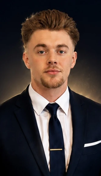 Joseph Ball in professional attire